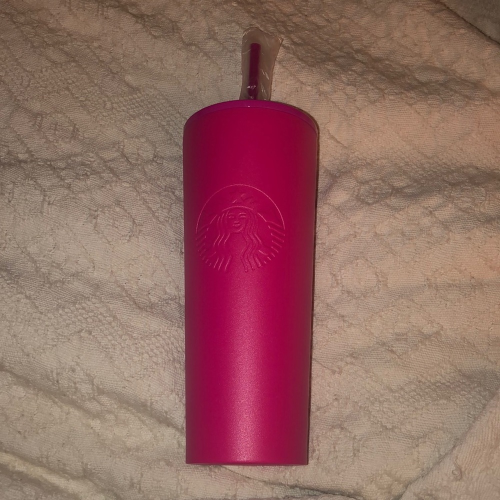 Starbucks pink “Barbie” pink tumbler.